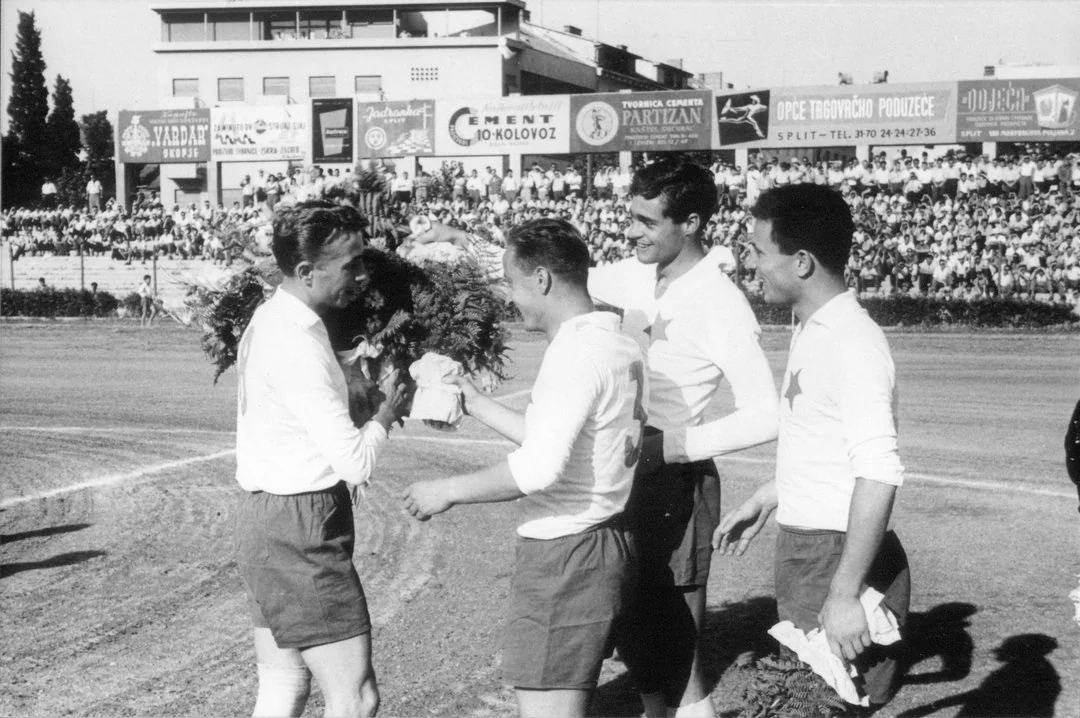 Uoči utakmice Hajduk – BSK: 3:1 (16. lipnja 1957.) povodom privremenog oproštaja Vukasa od Hajduka zbog odlaska u Bolognu, Bajdo je primio cvijeće od svojih suigrača Radovića, I. Bege i Žanetića... Vukas je bio prvi igrač Jugoslavije s dozvolom za inozemstvo.